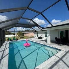 Enjoy Heated Salt Water Pool & Patio! Ideal for 2 Families