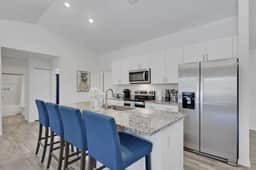 Spacious home w/ Heated Saltwater Pool & Private Pier! Perfect for two Families! - Image 4