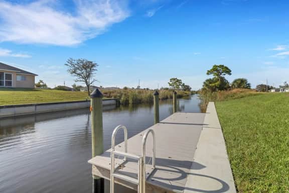 Oasis W/ Heated Salt Water Pool & Private Pier! Great for 2 Families!