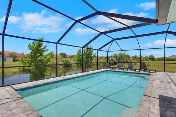 Spacious home w/ Heated Saltwater Pool & Private Pier! Perfect for two Families! - Image 1